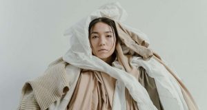 Woman wrapped in clothes