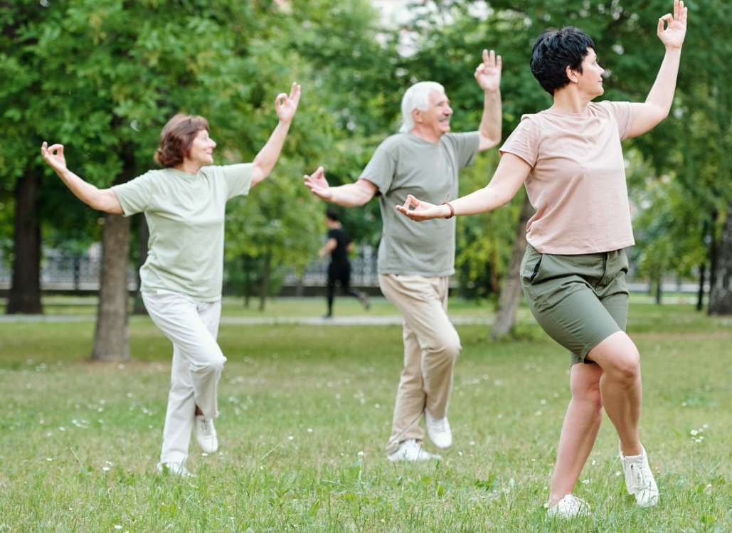 mature women exercising together