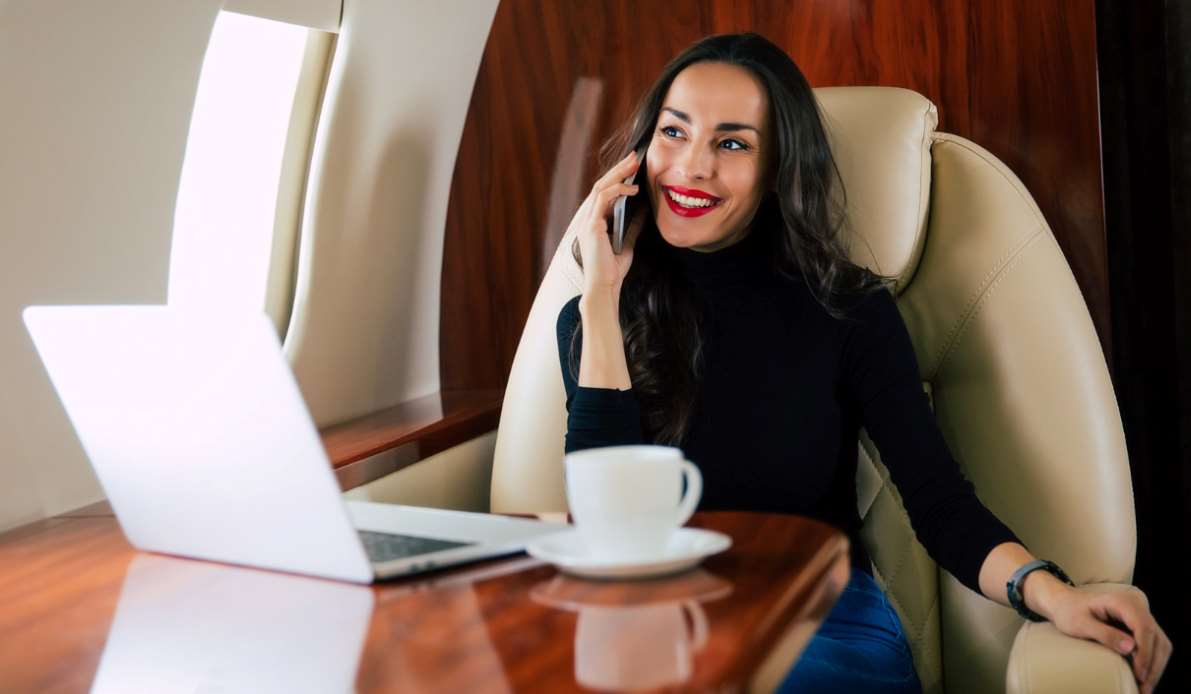 Business Woman in Private Jet