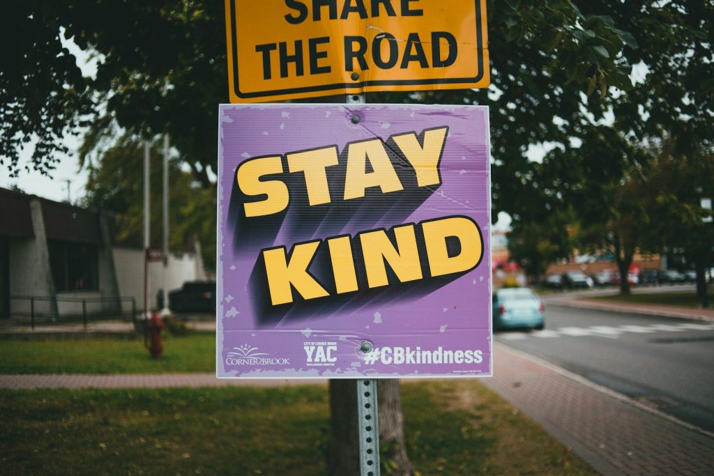 a sign on the side of a road